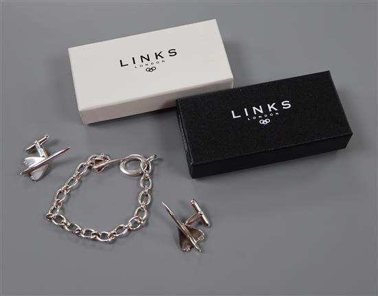 A Links of London Sterling silver Concorde charm bracelet and a similar pair of cufflinks, original boxes